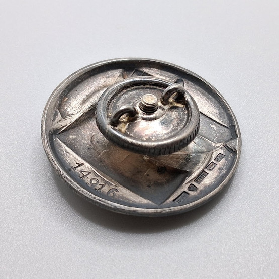 Ruuvimerkki, Suojeluskunta 1. luokan harrastusmerkki, hopeaa v. 1935