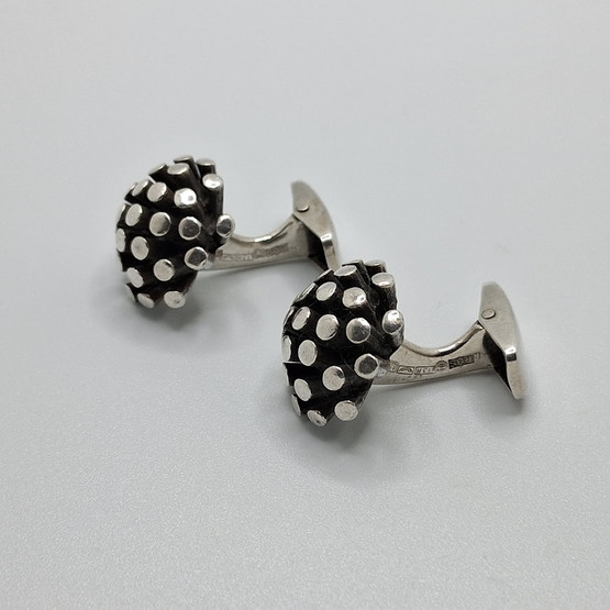 Kalvosinnapit, design R. Saastamoinen, hopeaa