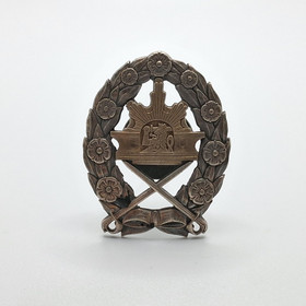 Kadettikoulun merkki