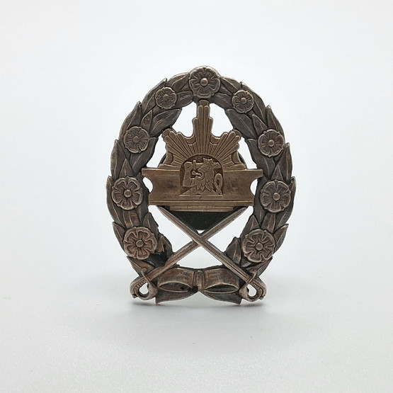 Kadettikoulun merkki