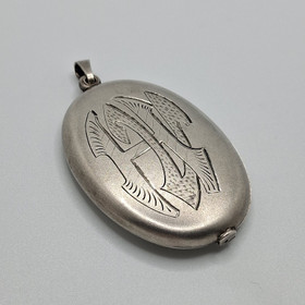Old locket, design Uljas Omo Koski, silver y. 1928