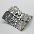 Rintakoru/riipus, design Elis Kauppi, Kupittaan Kulta