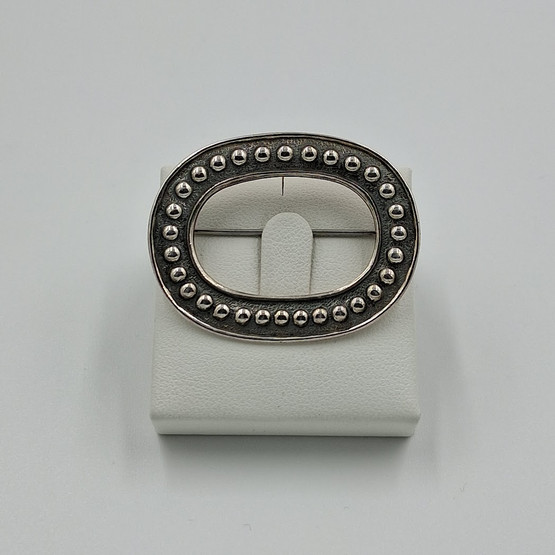 Rintakoru, design Holger Lindström, Kalevala Koru