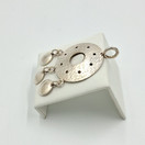 Riipus, design Edvard Kinni, hopeaa