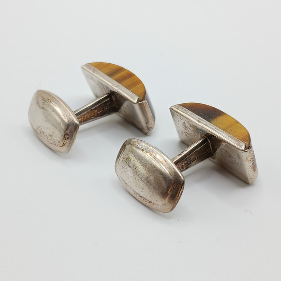 Kalvosinnapit, hopeaa