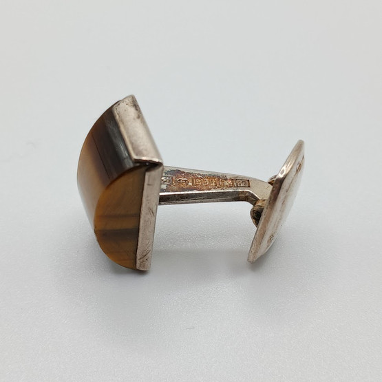 Kalvosinnapit, hopeaa