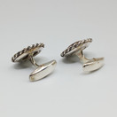 Kalvosinnapit, hopeaa