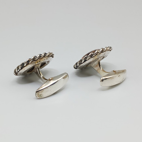 Kalvosinnapit, hopeaa