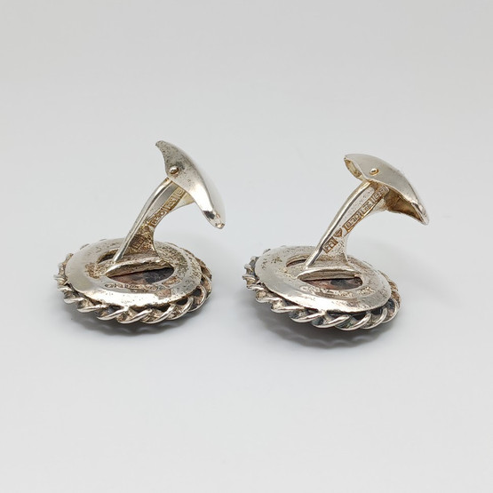 Kalvosinnapit, hopeaa