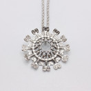 Aurinko-riipus, hopeaa, design Tapio Wirkkala