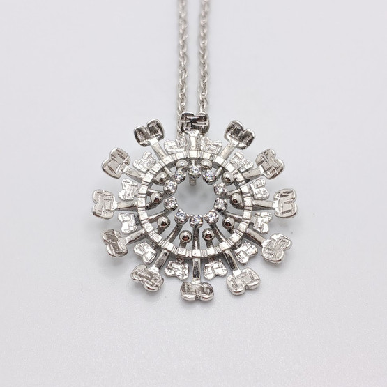 Aurinko-riipus, hopeaa, design Tapio Wirkkala