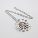 Aurinko-riipus, hopeaa, design Tapio Wirkkala