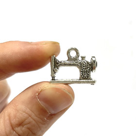 Merkki / riipus, ompelukone