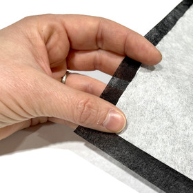 Vlieseline: Stitch-n-tear, revittävä tukikangas 45cm, musta ja valkoinen