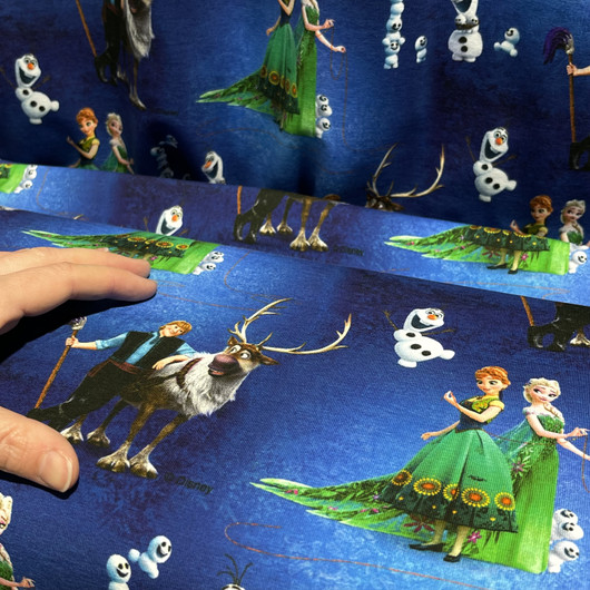 Frozen -trikookangas: Anna ja Elsa, tummansininen - vihreä
