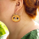 Oranssi Repputepposen naama – korvakorut