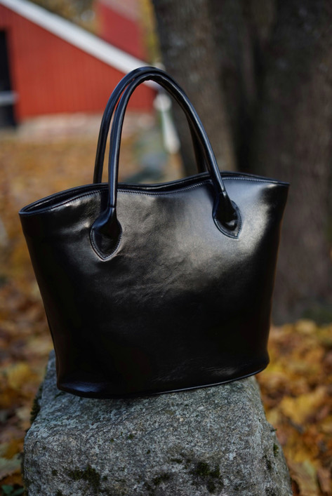 TANGO upeasti ylellinen laukku