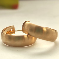 Kultaiset rengaskorvakorut