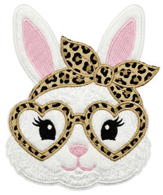 Värillinen silityskuva : Rusettipupu, ruskea rusetti