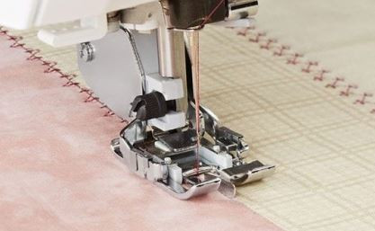 Vaihdettava koristeommeljalka ohjaimella