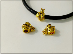 Hela, pörriäinen, antiikkikullan värinen