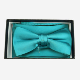 Rusetti ja taskuliina lahjakotelossa Turkoosi