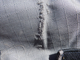 Harmaa fleecevuorellinen kaulakappale sadeloimeen S