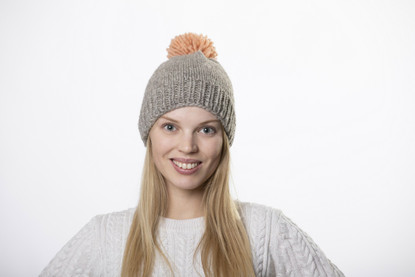 Beanie with big light pink pom pom