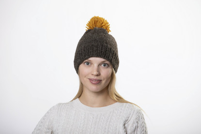 Beanie with big yellow pom pom