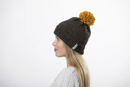 Beanie with big yellow pom pom