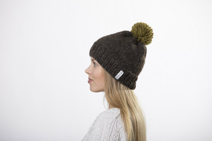 Beanie with big green pom pom