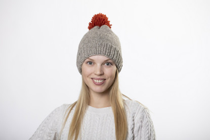 Beanie with big red pom pom