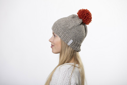 Beanie with big red pom pom