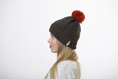 Beanie with big red pom pom