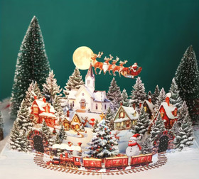 Pop-up kortti, joulujuna maisemassa