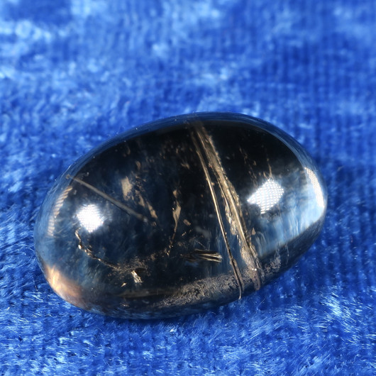 Kapussi rutiilikvartsi 15x23x9mm ovaali cabochon  nro R