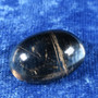 Kapussi rutiilikvartsi 15x23x9mm ovaali cabochon  nro R