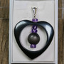 Riipus hematiittisydän ja ametistit. HILDA21