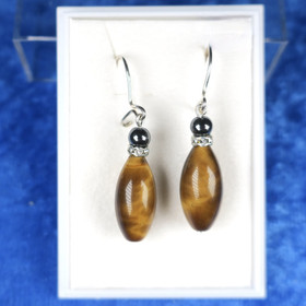 Korvakorut tiikerinsilmä ja hematiitti zirkonikoristein