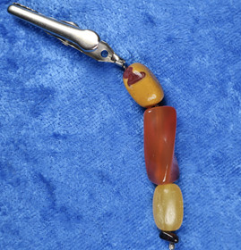 Nipsu OINAS oinaan onnenkivet