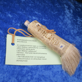 Poronsarvijauhetta poronsarvessa, karvatupsu poronkarvasomisteena