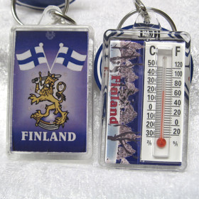 Avaimenperä lämpömittari Suomen leijona ja Suomen liput