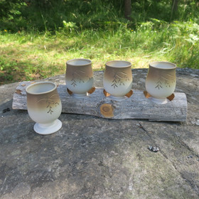 Hömpsypölkky setissä 4 keramiikkapikaria  K