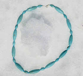 Helmet magnesiitti turkoosivärjätty 47cm pitkä palkohelmi. PALKO