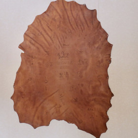 Poronnahka 140x100cm johon poltettu noitarumpumerkkejä selityksineen