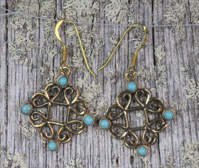 Pronssikorvakorut neliöpitsi, turkoosin värinen