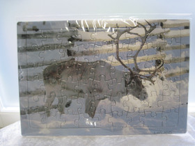 Palapeli poro ja lunta 