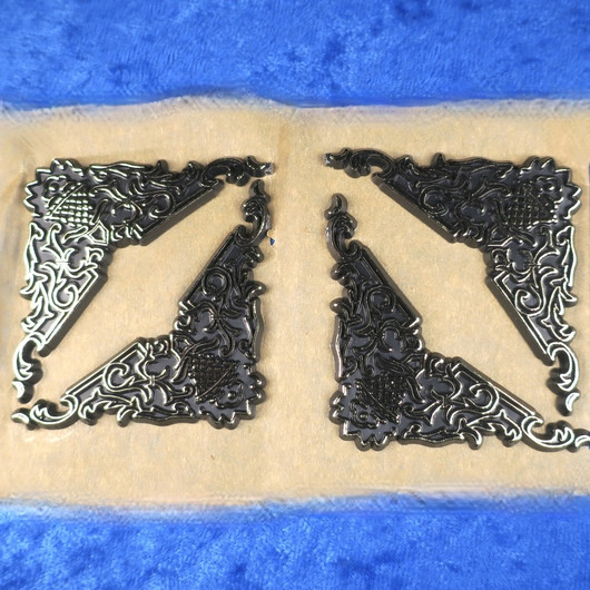 Kellotarvikkeet kulmakoristeet 50mm