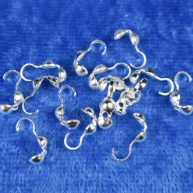 Solmunsuoja hopeanvärinen korutarvike