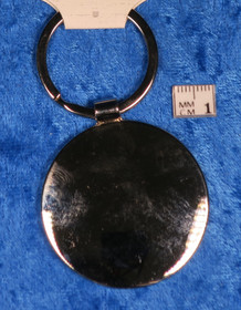 Avaimenperä poro ja punaiset revontulet, metallia